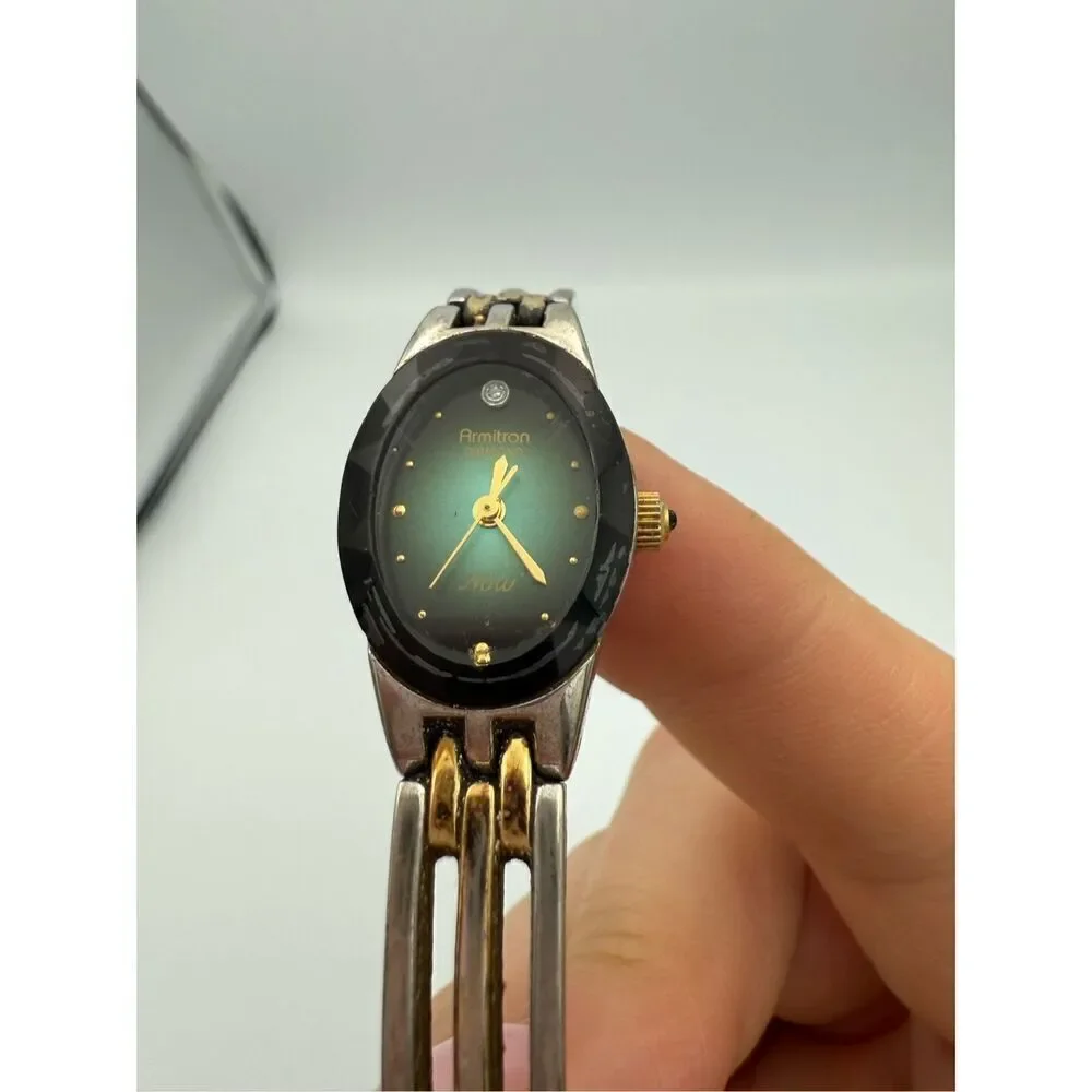 Armitron Womens Green Dial Two-Tone Quartz Now Diamond Watch